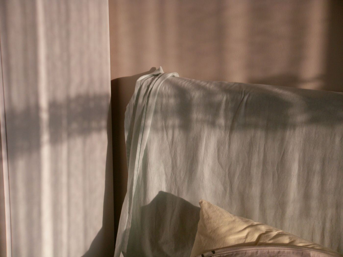 Warm light on crumpled linen