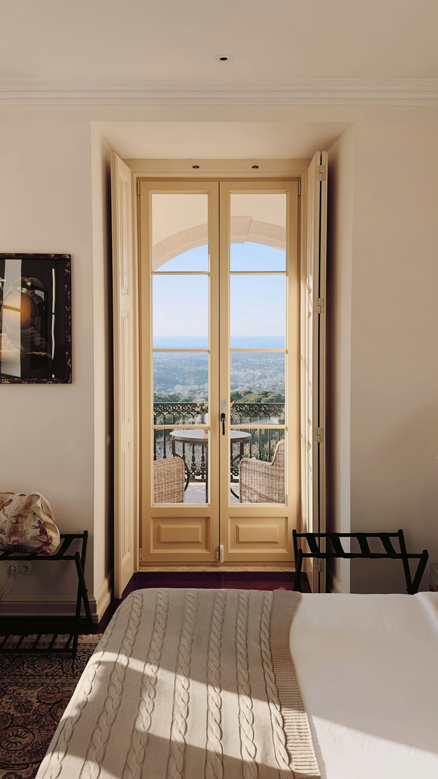 Tall doors opening onto a balcony