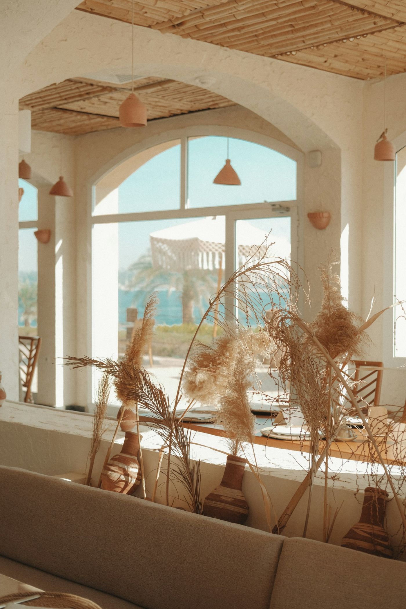 A warm room with an arched window